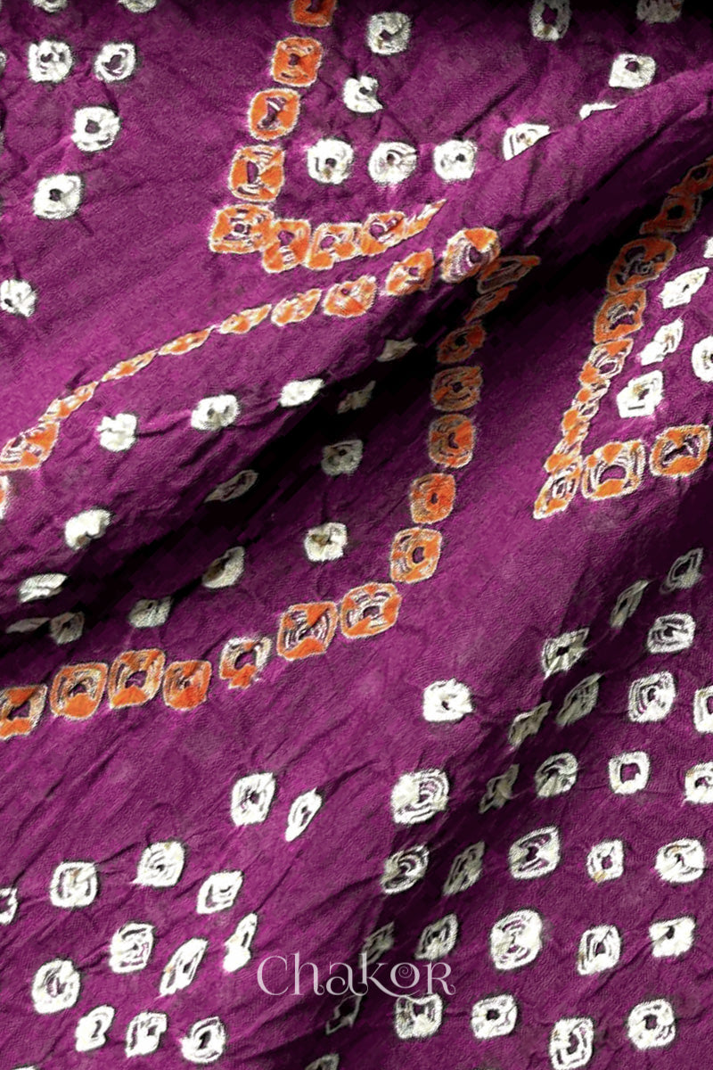 Traditional Chorkat Bandhani pattern with dense hand tied dots on Magenta cotton dupatta.
