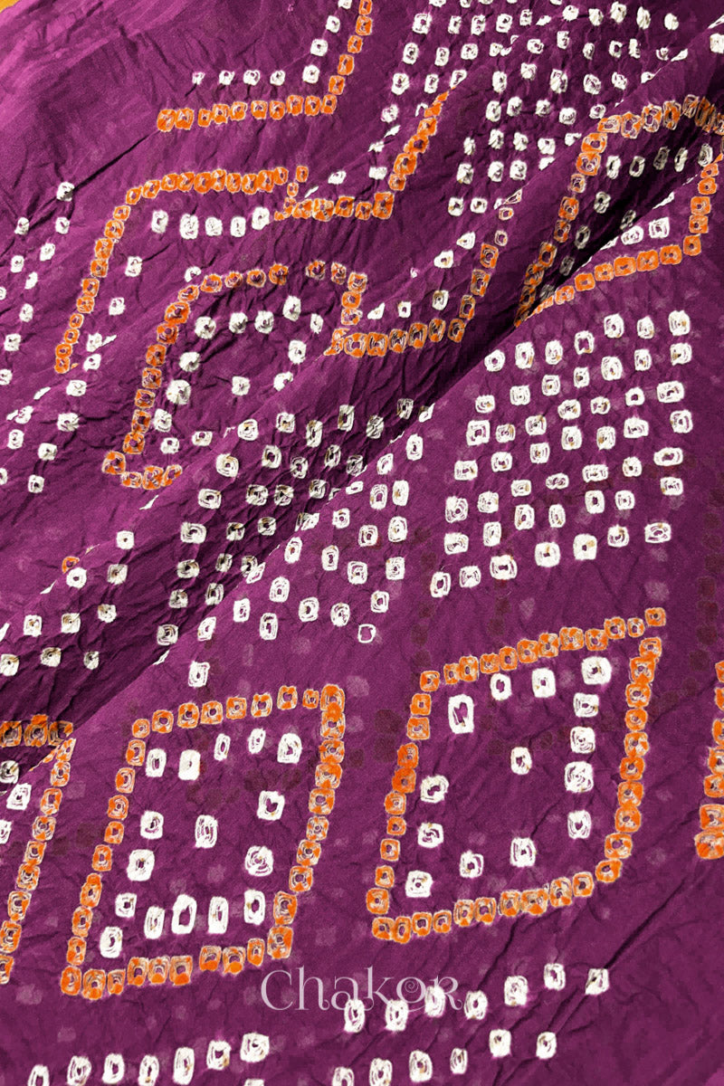 Traditional Chorkat Bandhani pattern with dense hand tied dots on Magenta cotton dupatta.
