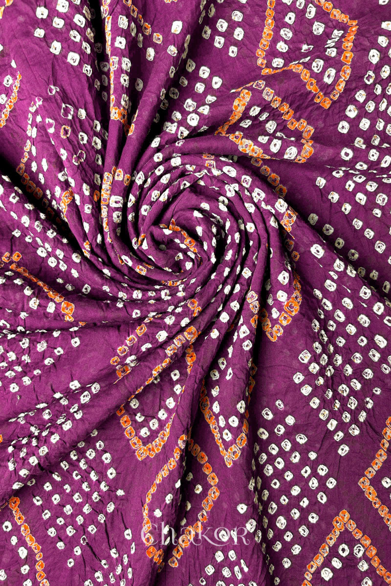 Magenta Bandhani dupatta border detail featuring Chorkat diamond motifs.
