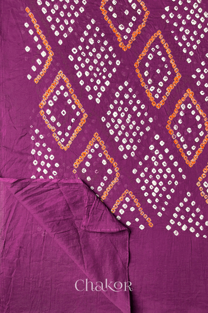 Magenta Bandhani dupatta border detail featuring Chorkat diamond motifs.
