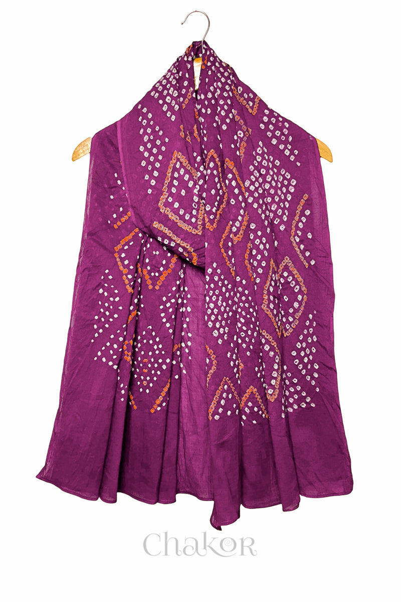 Full length view of handmade Kutch Bandhani dupatta in Magenta mulmul cotton.

