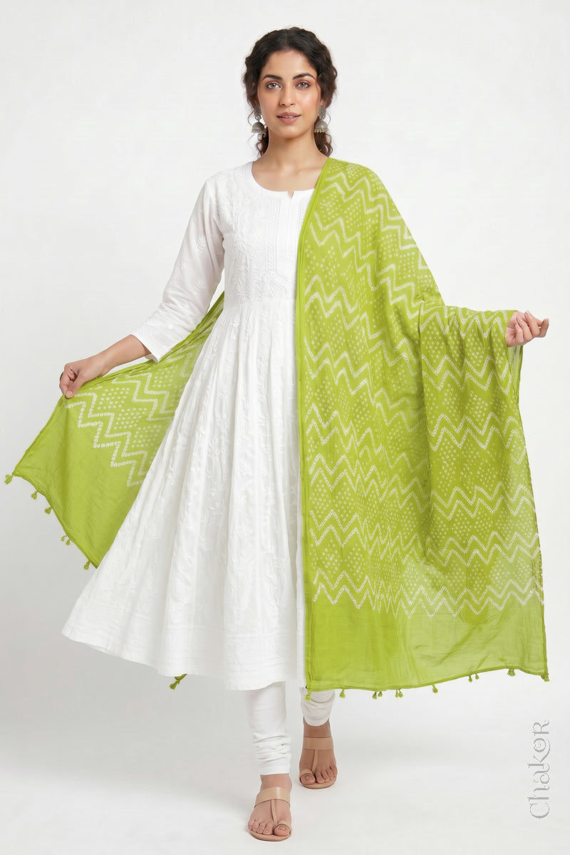 Lime Green Kutch Bandhani dupatta in mercerised mulmul cotton shown in side drape styling.

