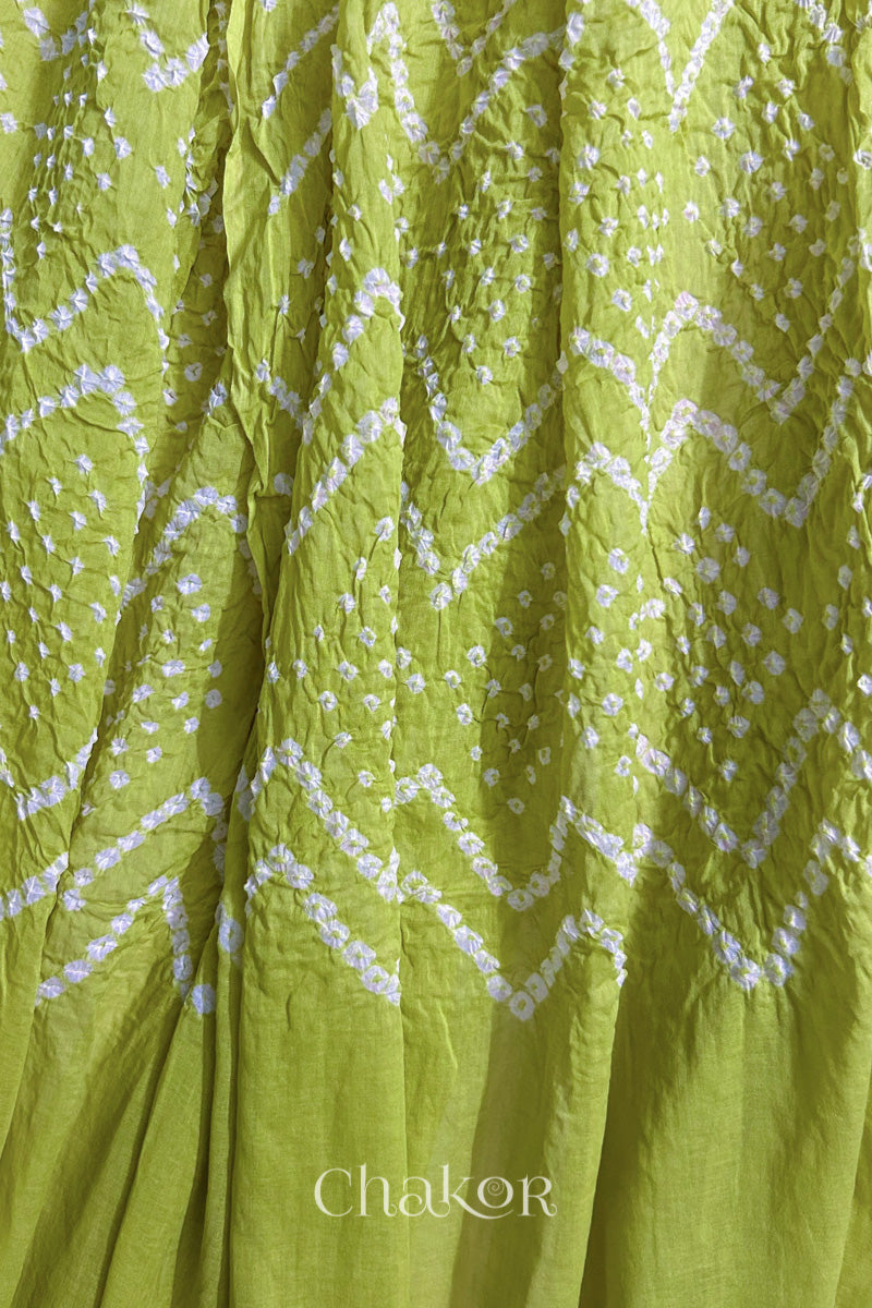 Detailed view of Bandhani tie-dye pattern and fabric fall on Lime Green cotton dupatta.
