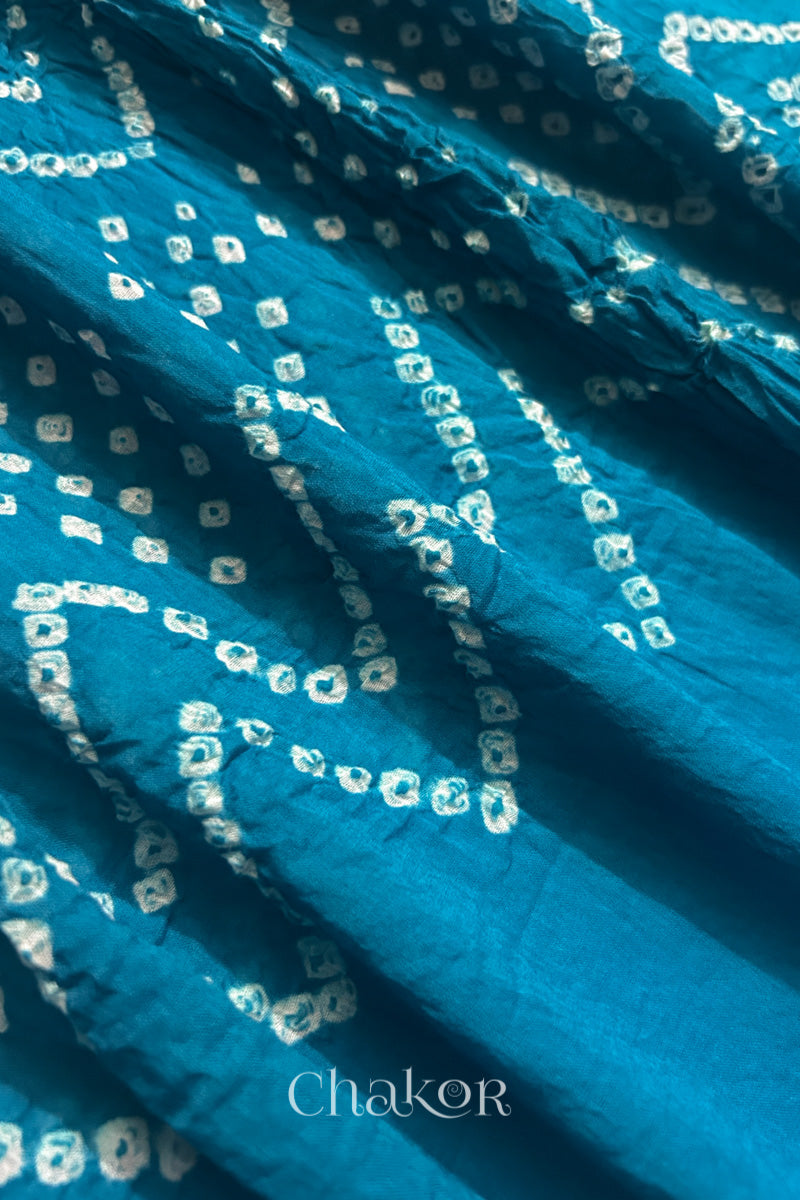 Soft mercerised mulmul cotton texture with authentic Bandhani tie dye work.