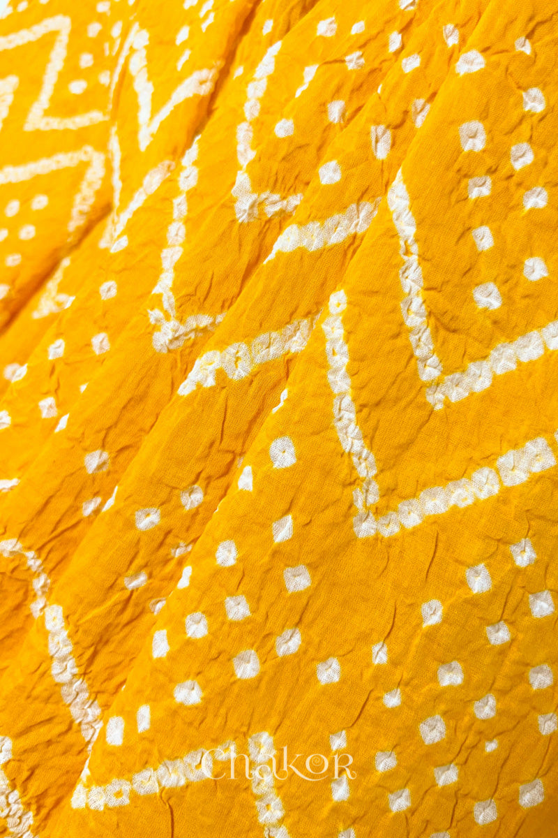 Soft mercerised mulmul cotton texture with authentic Bandhani tie dye work.
