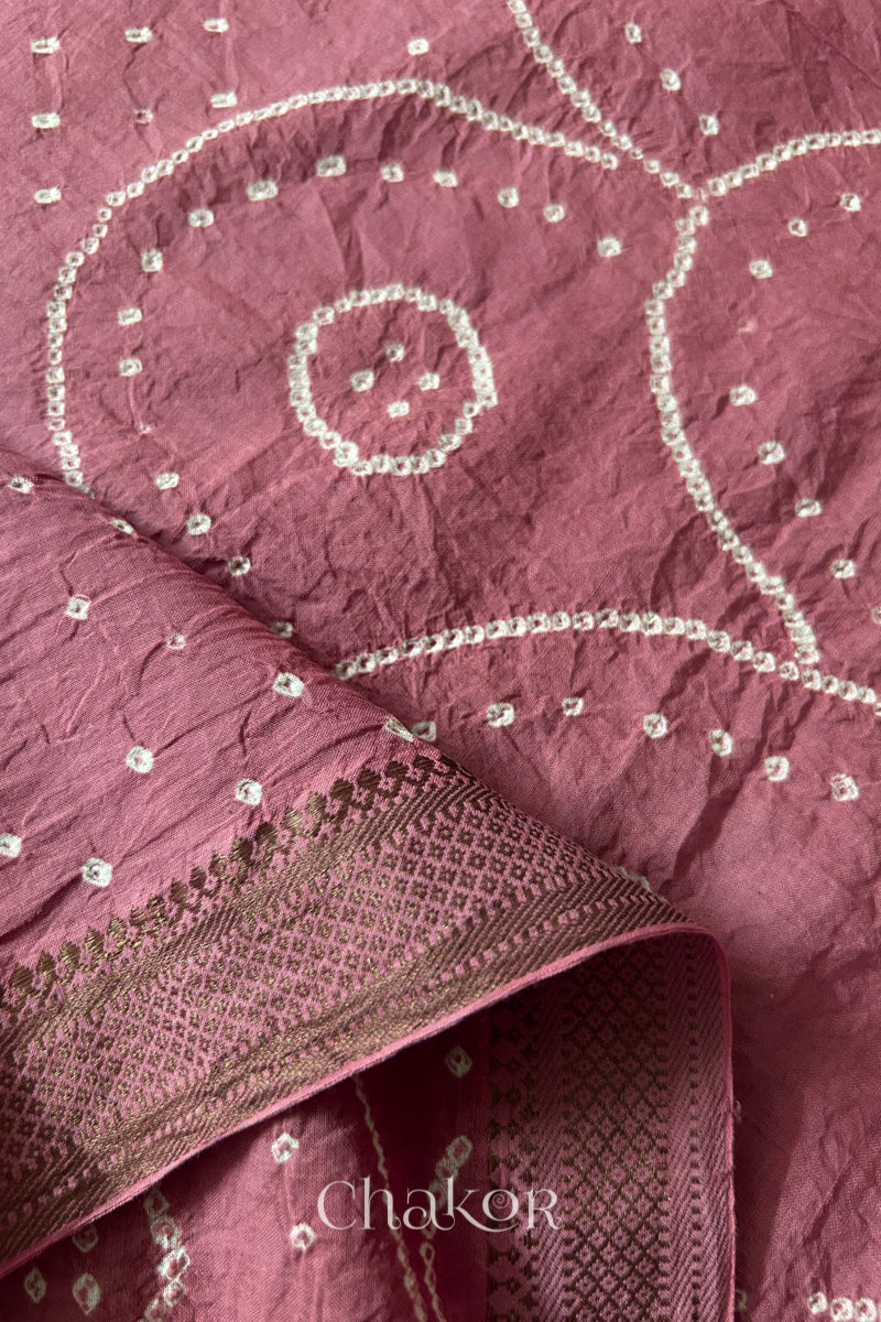 Close-up of the golden zari border on Old Rose Pink handloom Mangalgiri cotton Bandhani dupatta.
