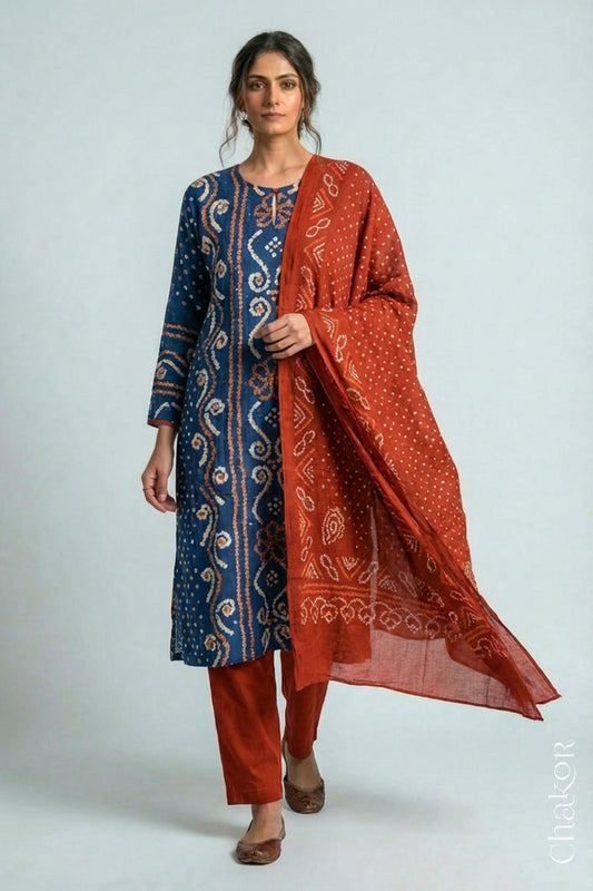 Model wearing Indigo Blue Bandhani Cotton Tunic with Rust Pant with Dupatta, Handcrafted in Kutch with traditional tie-dye design and hand embroidery.