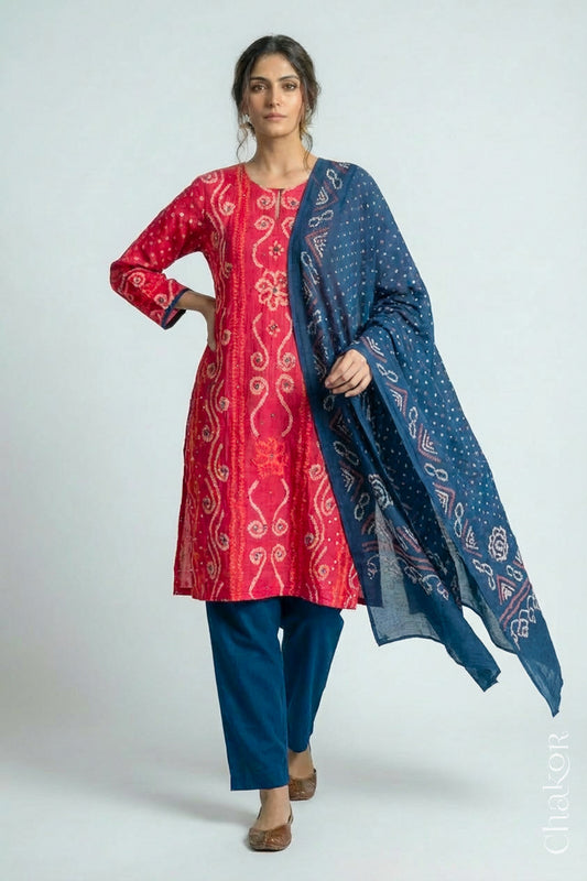Model wearing Pink Bandhani Cotton Tunic and Indigo Blue Pant with Dupatta, Handcrafted in Kutch with traditional design and hand embroidery.