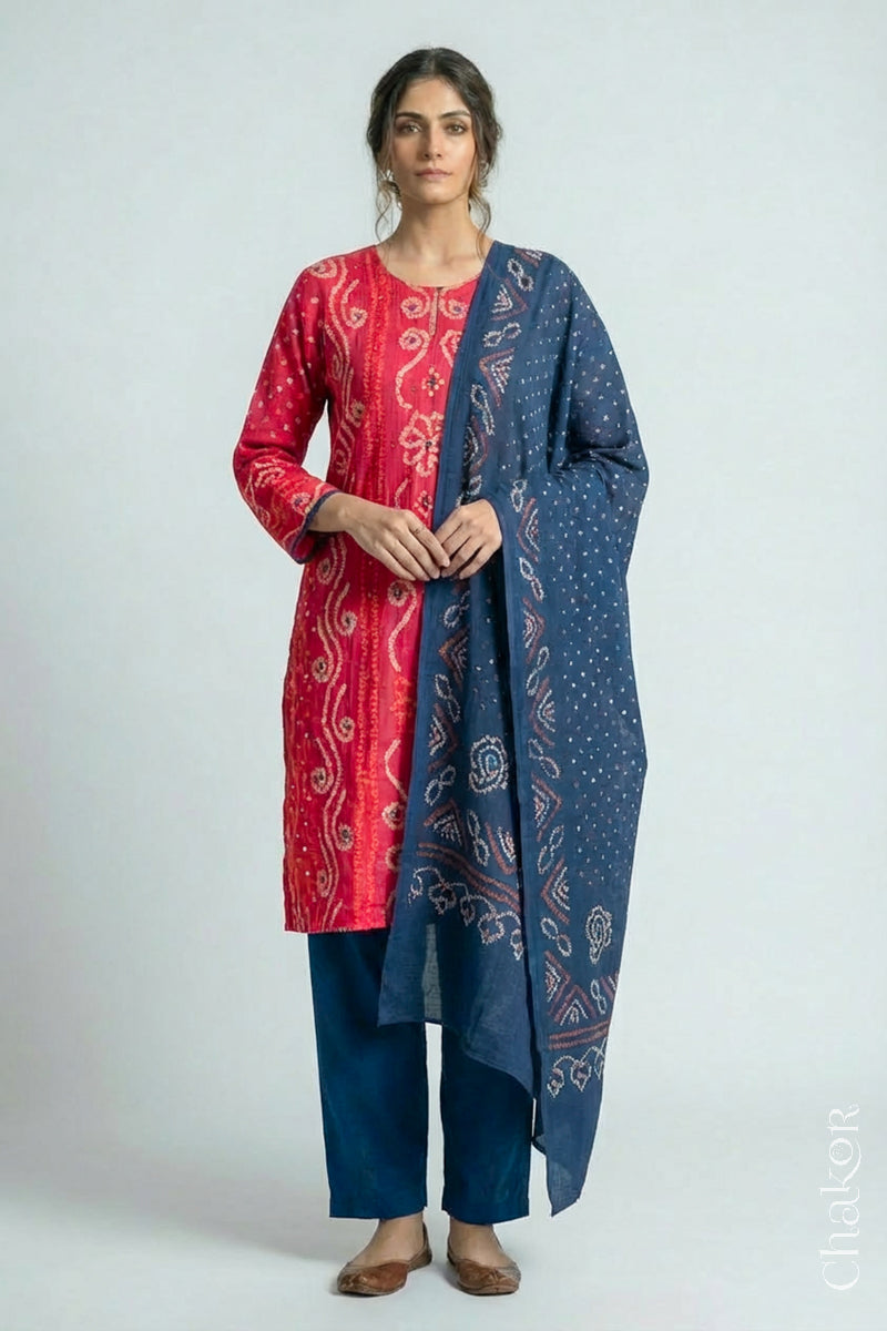 Model wearing Pink Bandhani Cotton Tunic and Indigo Blue Pant with Dupatta, Handcrafted in Kutch with traditional design and hand embroidery.