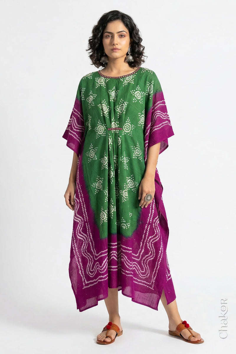 Handcrafted Kutch bandhani kaftan dress in breathable mulmul cotton with mirror & mukaish work.
