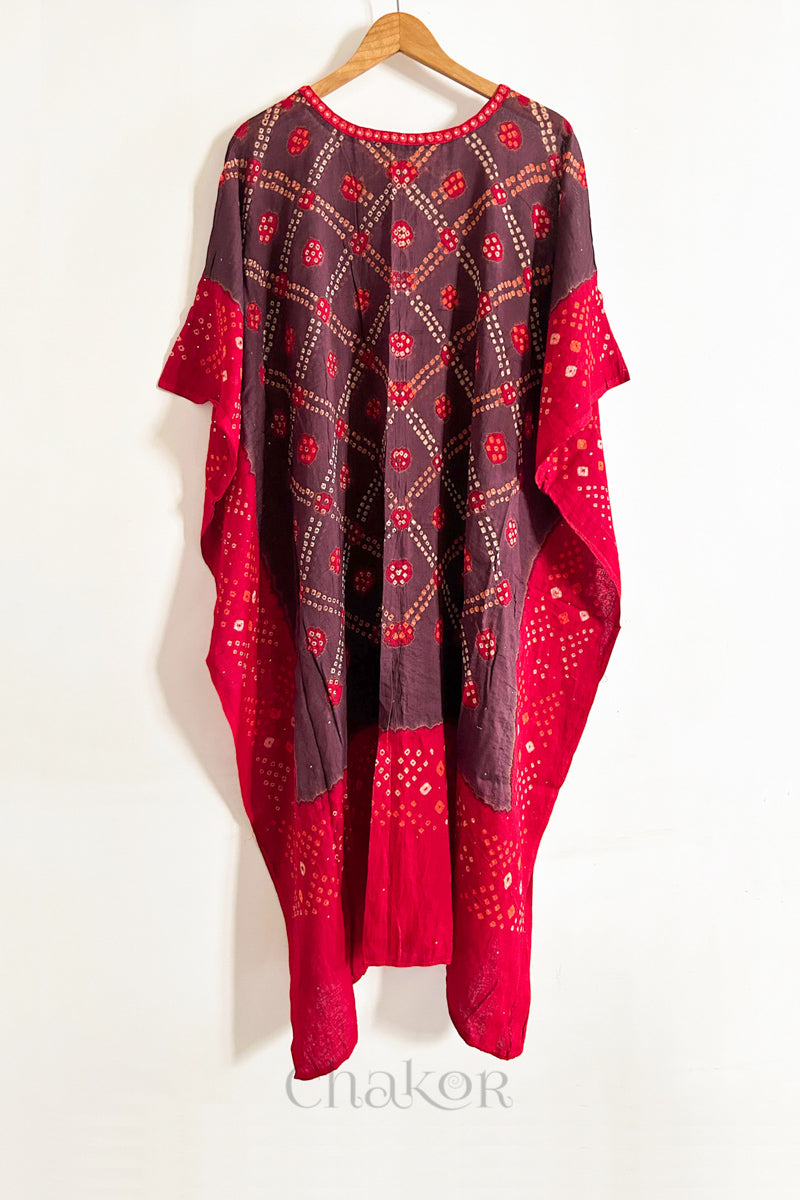 Handcrafted Kutch bandhani women's kaftan hanging full length in mulmul cotton with mirror work, loose fit for summer.
