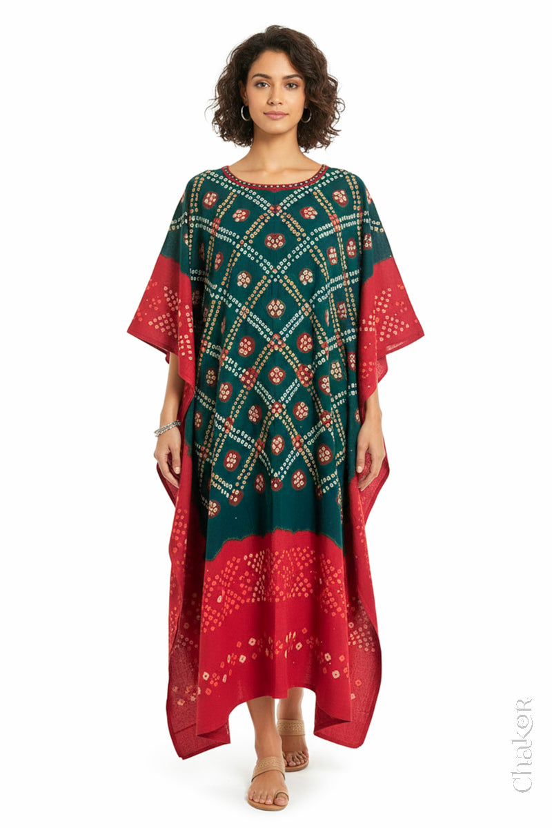 Handcrafted Kutch bandhani kaftan dress in breathable mulmul cotton with mirror & mukaish work.
