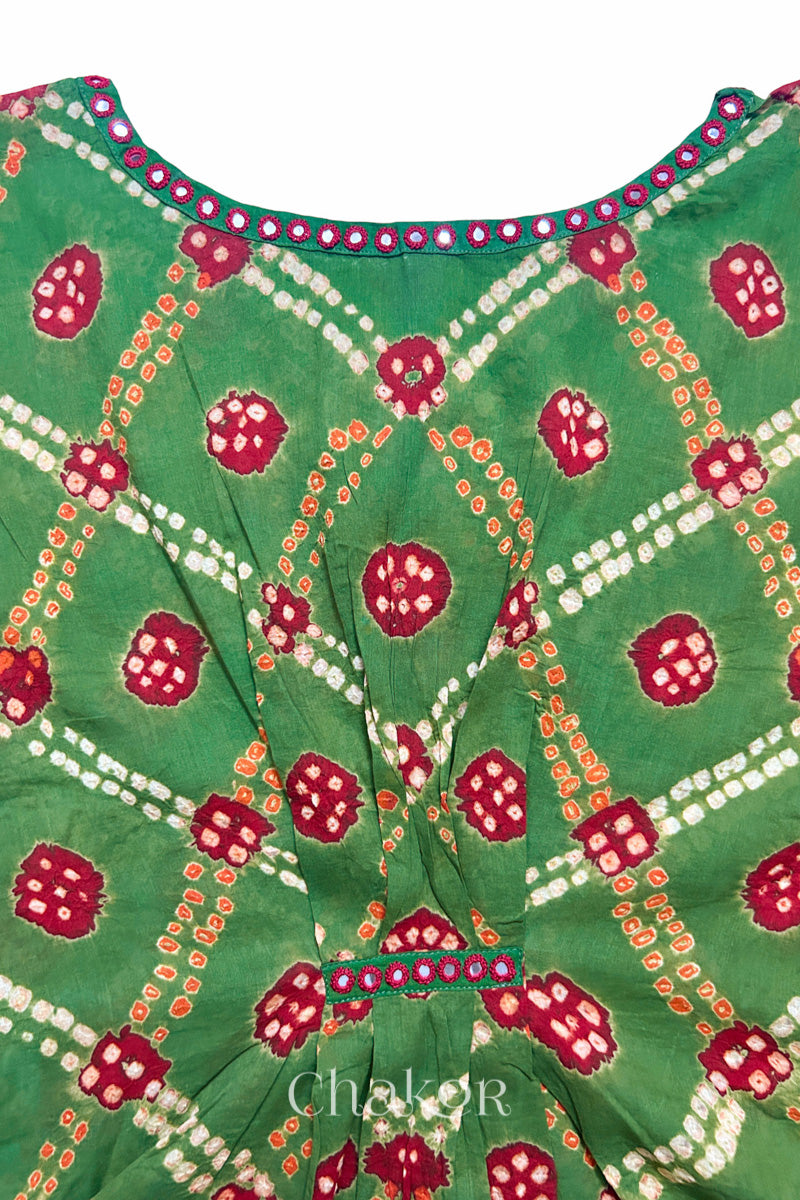 Kutch Bandhani pattern with mirror neckline detail on handcrafted cotton mulmul kaftan dress.

