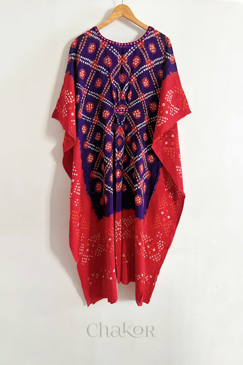 Handcrafted Kutch bandhani women's kaftan hanging full length in mulmul cotton with mirror work, loose fit for summer.
