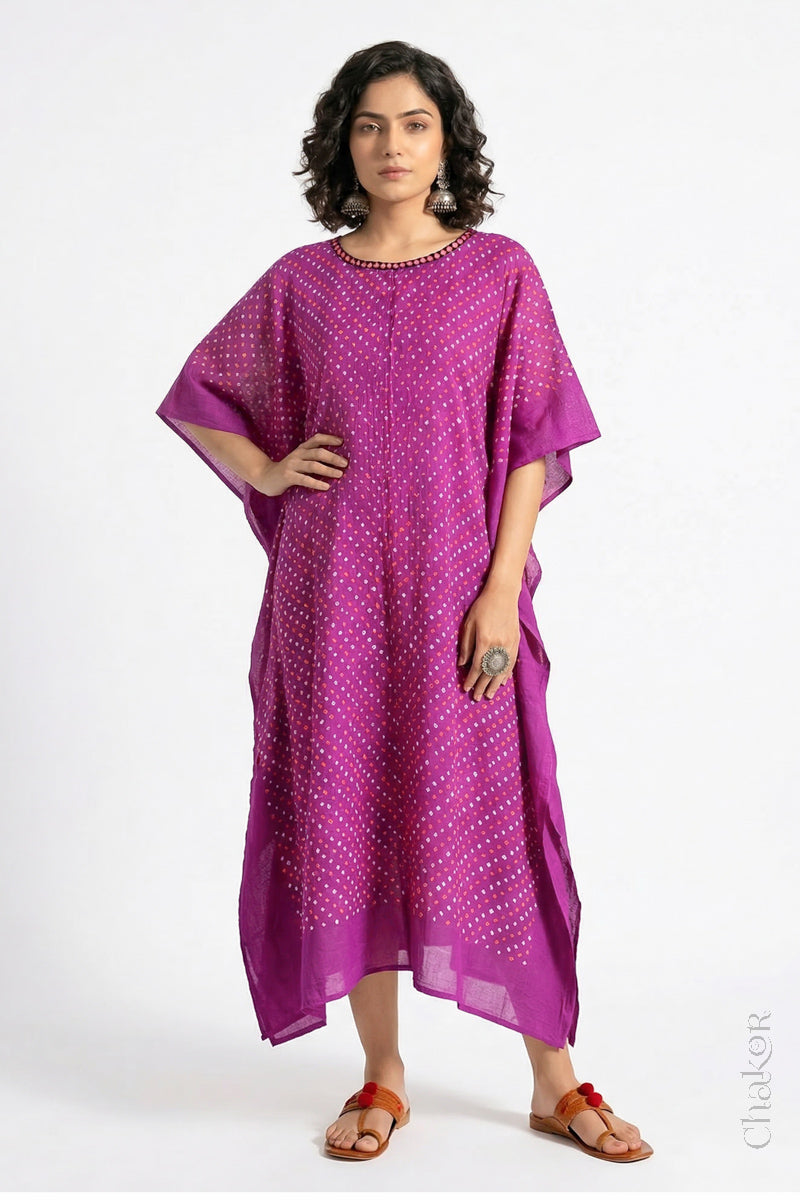 Handcrafted Kutch bandhani kaftan dress in breathable mulmul cotton with mirror work.
