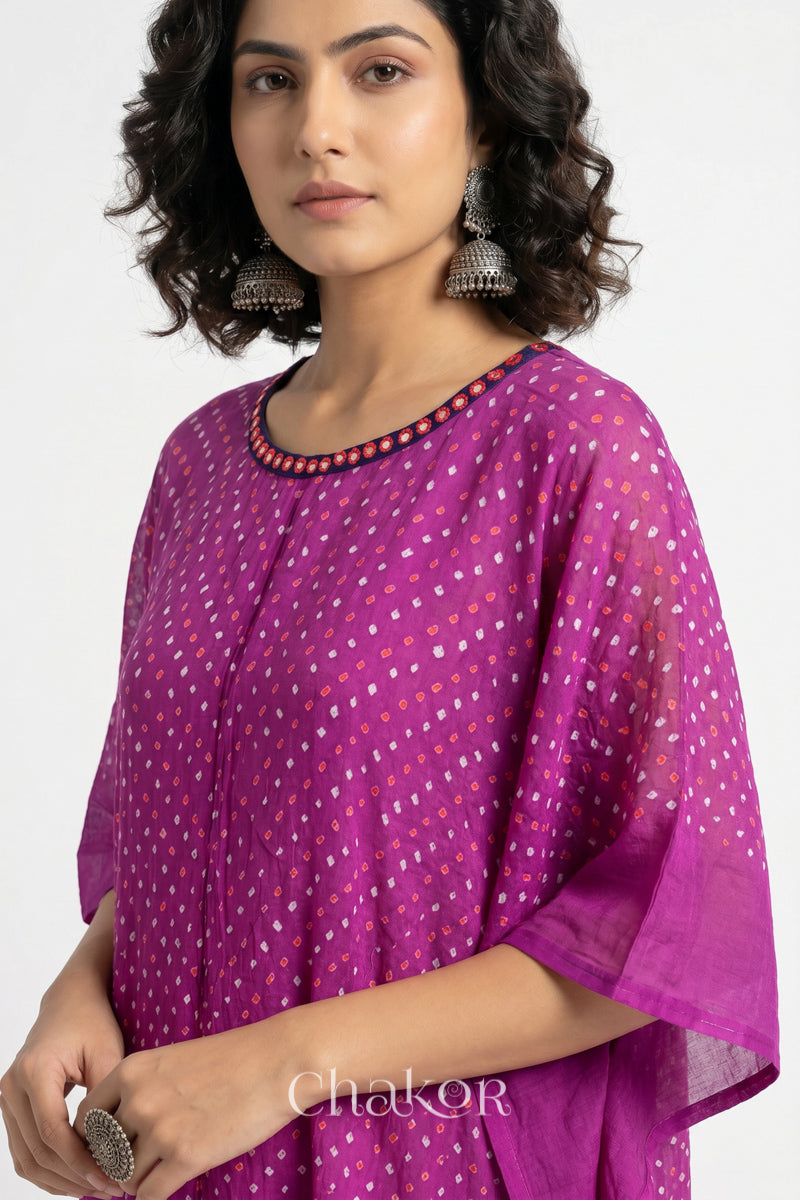 Bandhani kaftan neckline with mirror work detail in magenta mulmul cotton for summer.
