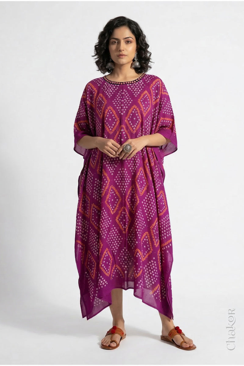 Handcrafted Kutch bandhani kaftan dress in breathable mulmul cotton with mirror & mukaish work.
