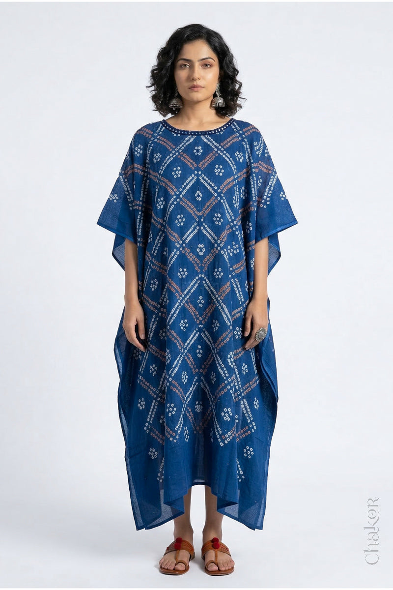 Handcrafted Kutch bandhani kaftan dress in breathable mulmul cotton with mirror & mukaish work.
