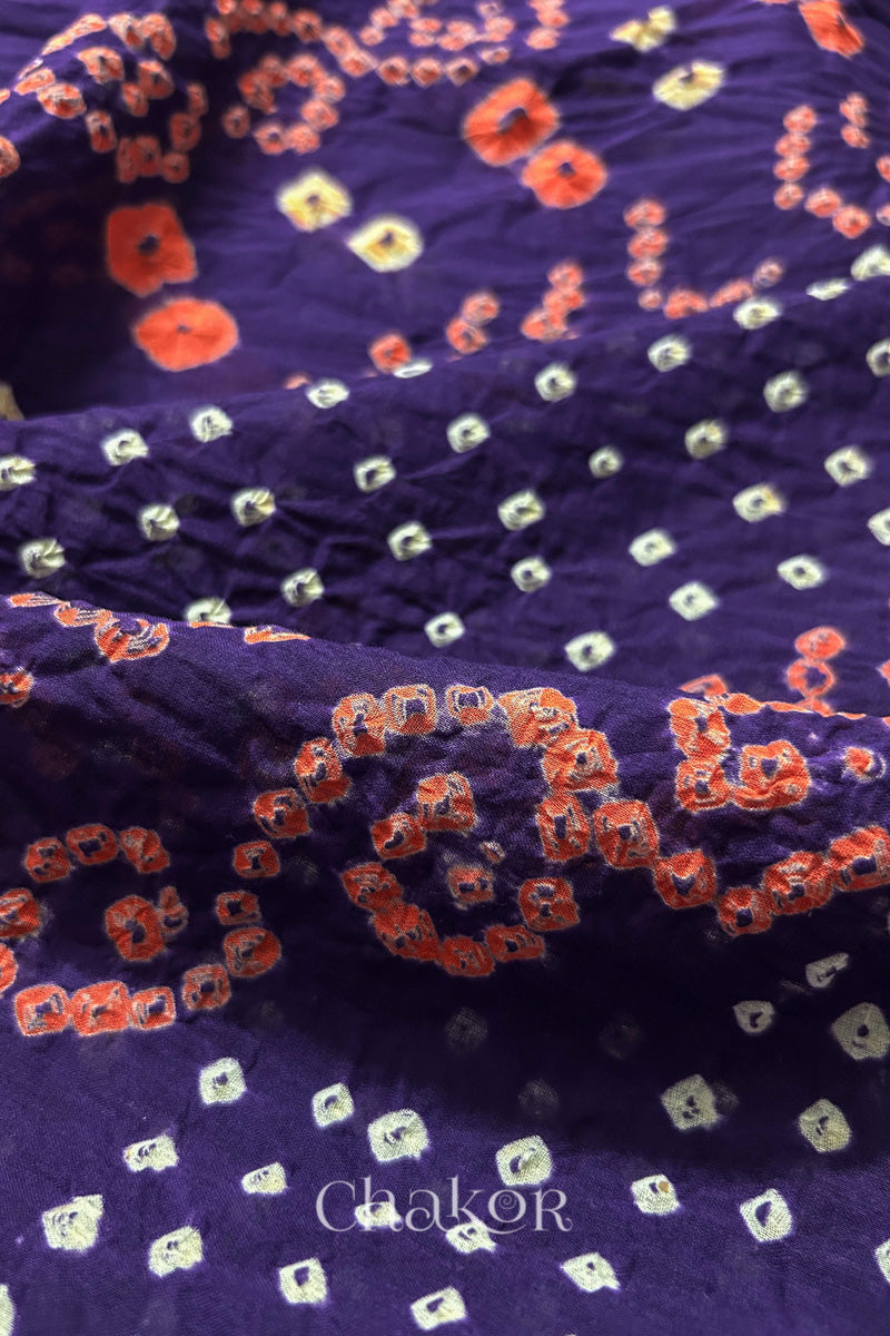 Close up of Tridev Mulmul Cotton purple saree with handcrafted Bandhani  – The Chakor Shop.