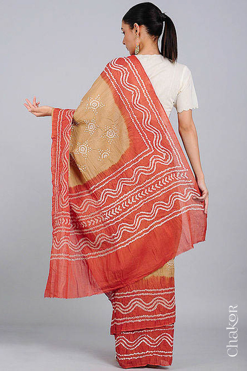 Handcrafted Beige Rust Bandhani Mul Cotton Saree by Chakor.
