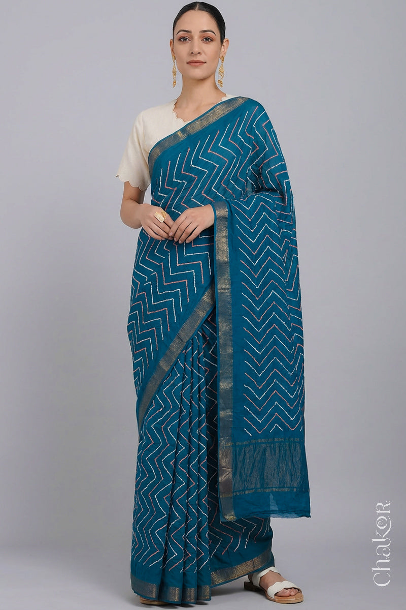 Woman wearing Indigo Blue Bandhani Mangalagiri Handloom Cotton Saree, with handcrafted rai bandhej patterns using traditional tie-dye techniques.