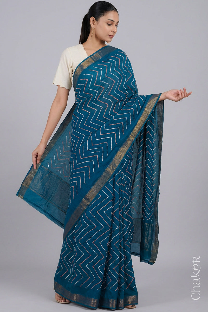 Woman wearing Indigo Blue Bandhani Mangalagiri Handloom Cotton Saree, with handcrafted rai bandhej patterns using traditional tie-dye techniques.