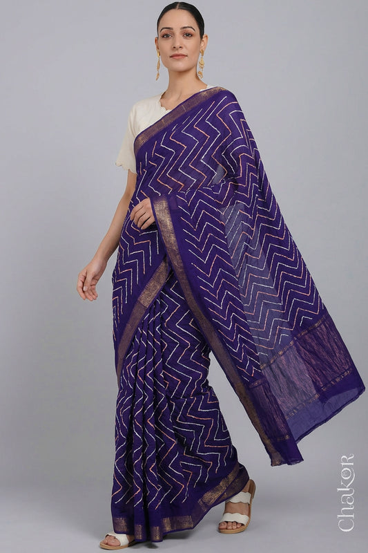 Woman wearing Purple Bandhani Mangalagiri Handloom Cotton Saree, with handcrafted rai bandhej patterns using traditional tie-dye techniques.