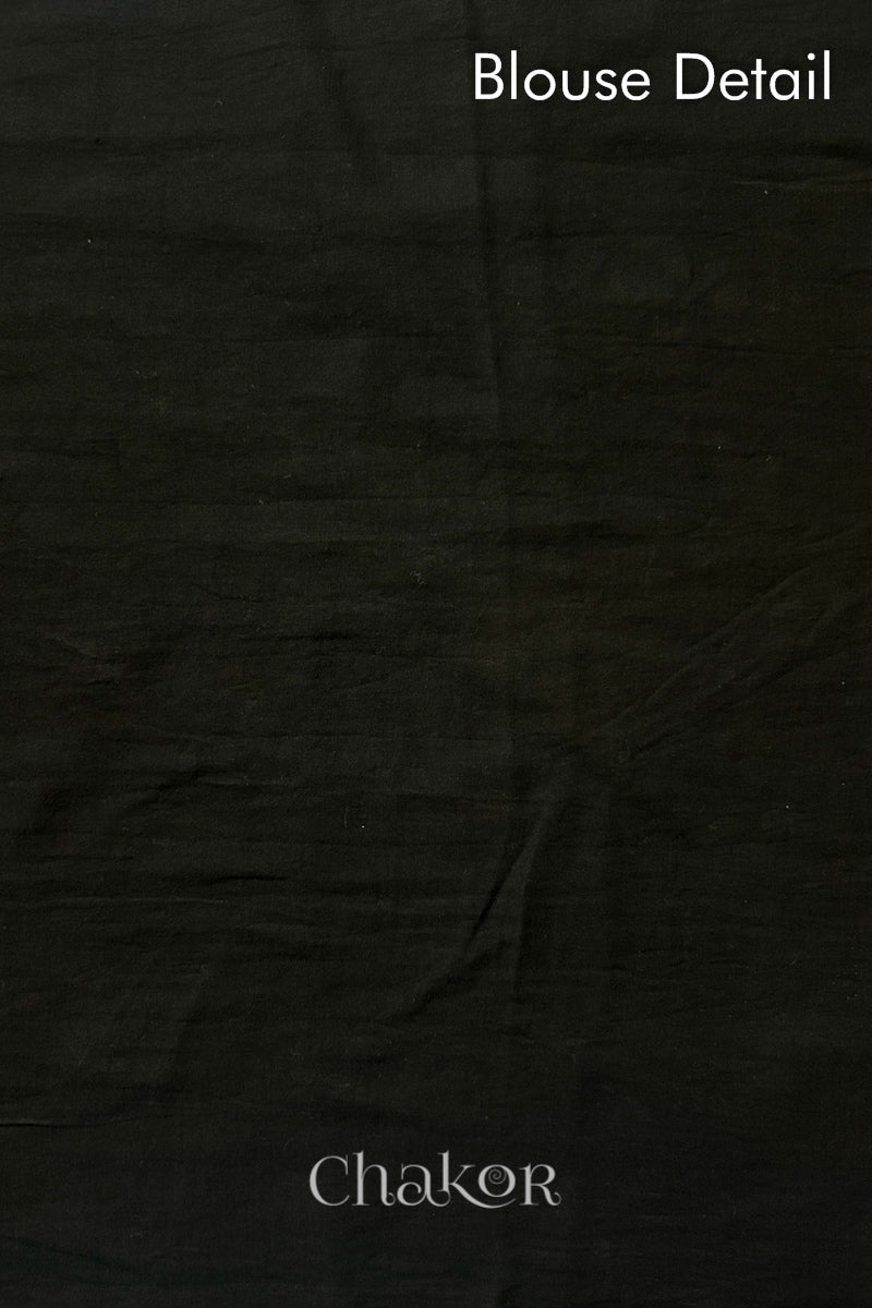 Blouse fabric detail of Black and Magenta Bandhani Mul Cotton Saree featuring multicoloured bandhej patterns.