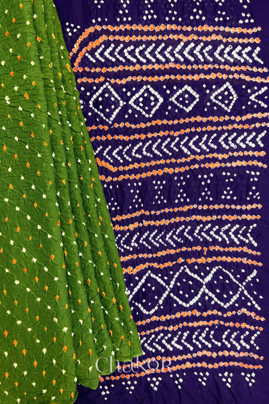 Pleats and pallu view of Mehendi Green and Purple Bandhani Mul Cotton Saree featuring multicoloured bandhani patterns.