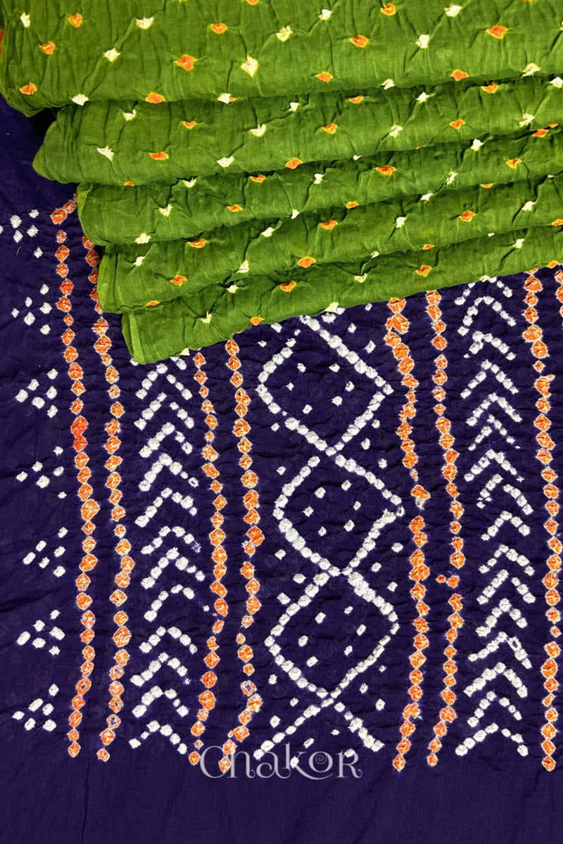 Pleats and pallu view of Mehendi Green and Purple Bandhani Mul Cotton Saree featuring multicoloured bandhani patterns.