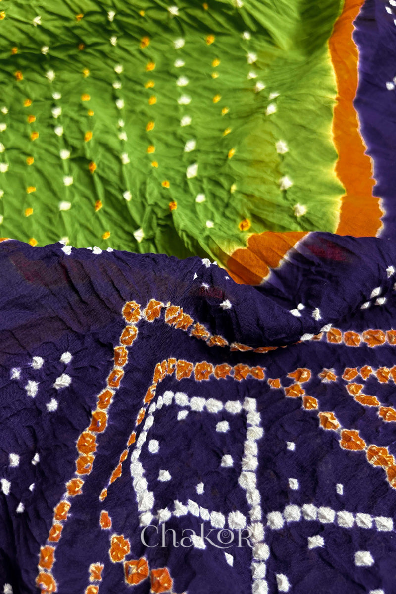 Close up of Mehendi Green and Purple Bandhani Mul Cotton Saree featuring multicoloured bandhej patterns.