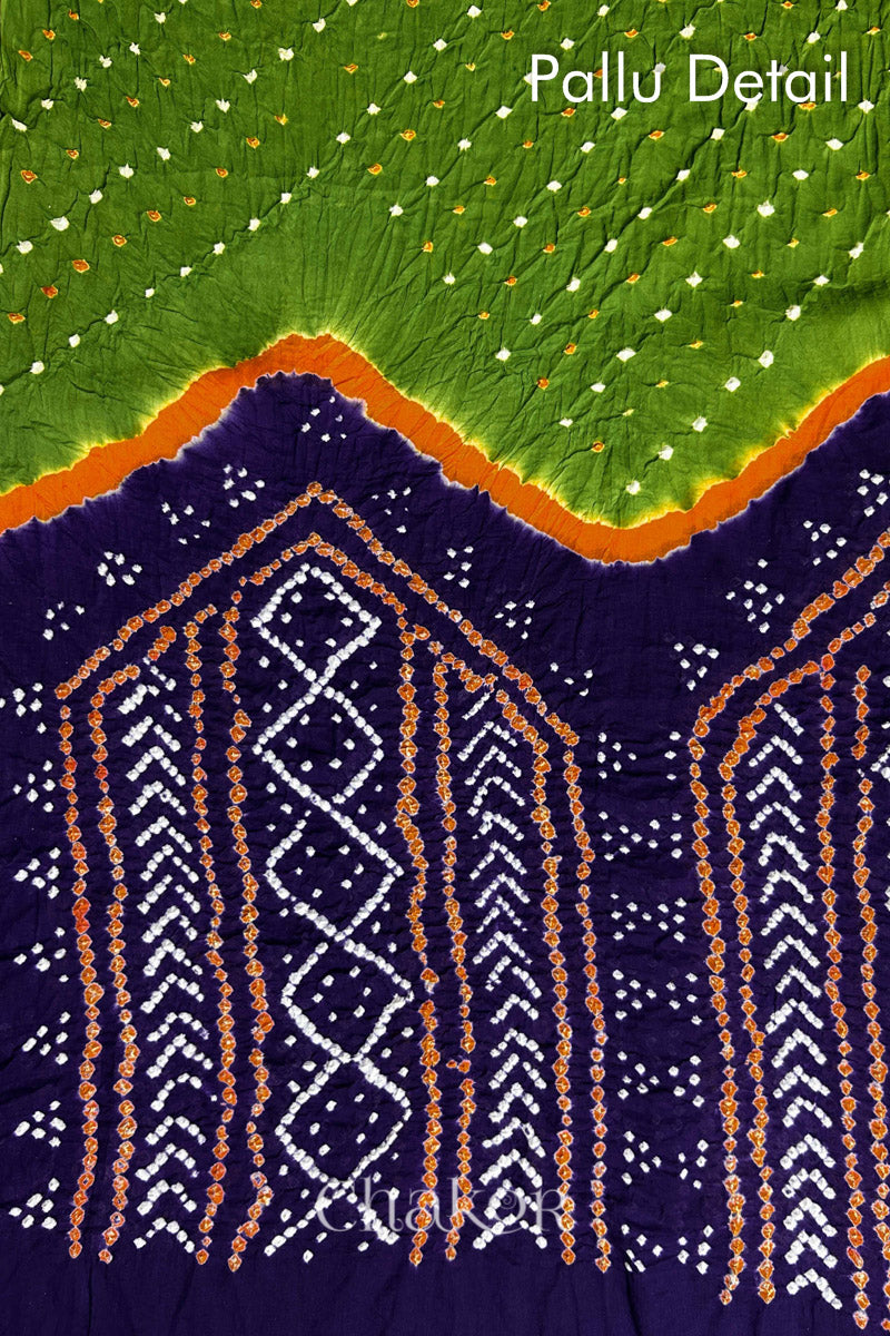Pallu detail of Mehendi Green and Purple Bandhani Mul Cotton Saree featuring multicoloured bandhej patterns.