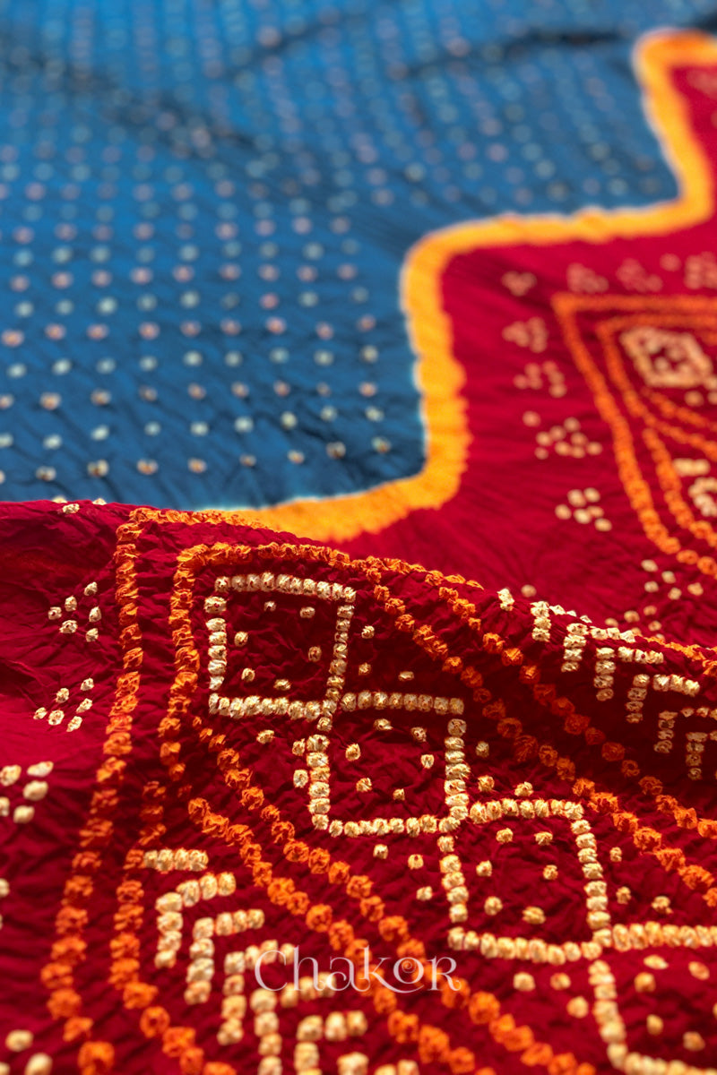 Close up of Indigo and Red Bandhani Mul Cotton Saree featuring multicoloured bandhani patterns.