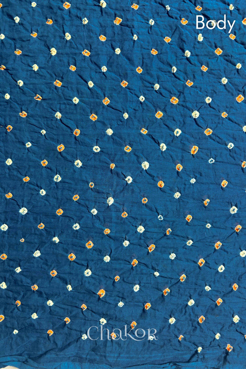 Body detail of Indigo and Red Bandhani Mul Cotton Saree featuring multicoloured bandhani patterns.
