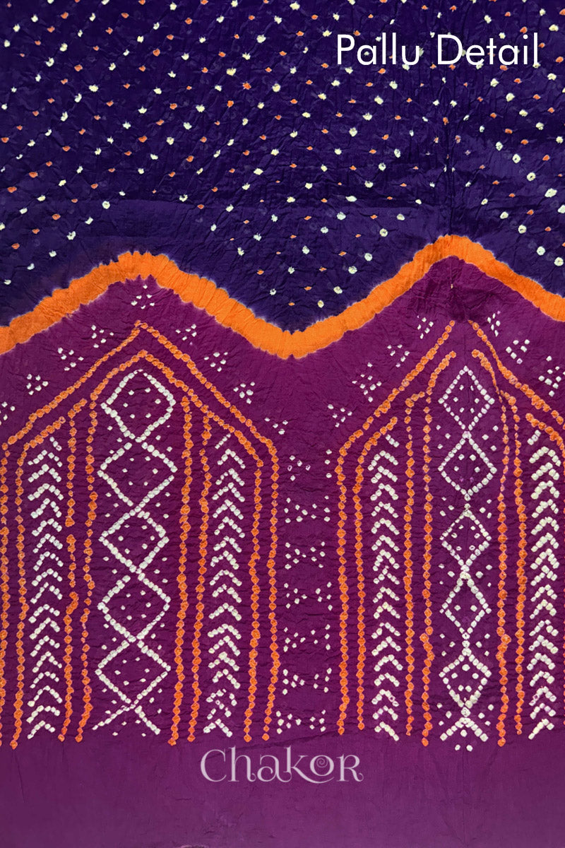 Pallu detail of Purple and Magenta Bandhani Mul Cotton Saree featuring multicoloured bandhani patterns.