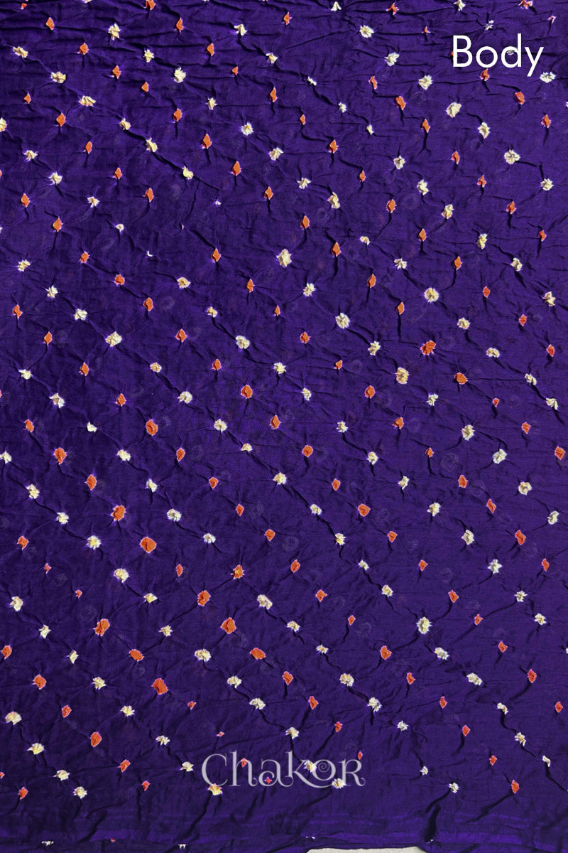Body detail of Purple and Magenta Bandhani Mul Cotton Saree featuring multicoloured bandhani patterns.