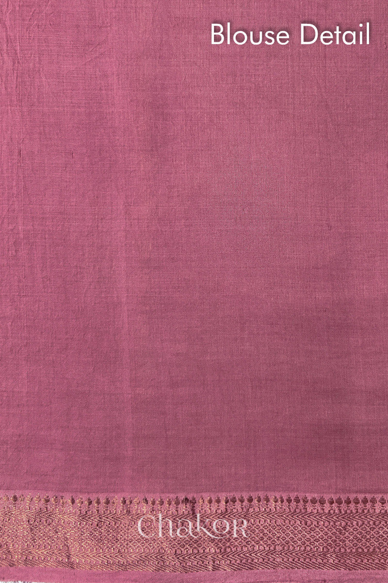 Blouse detail of Old rose bandhani saree with woven golden zari border.
