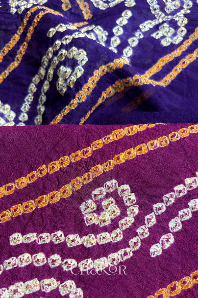 Close up of Purple Magenta Bandhani Mul Cotton Saree featuring multicoloured bandhani patterns.