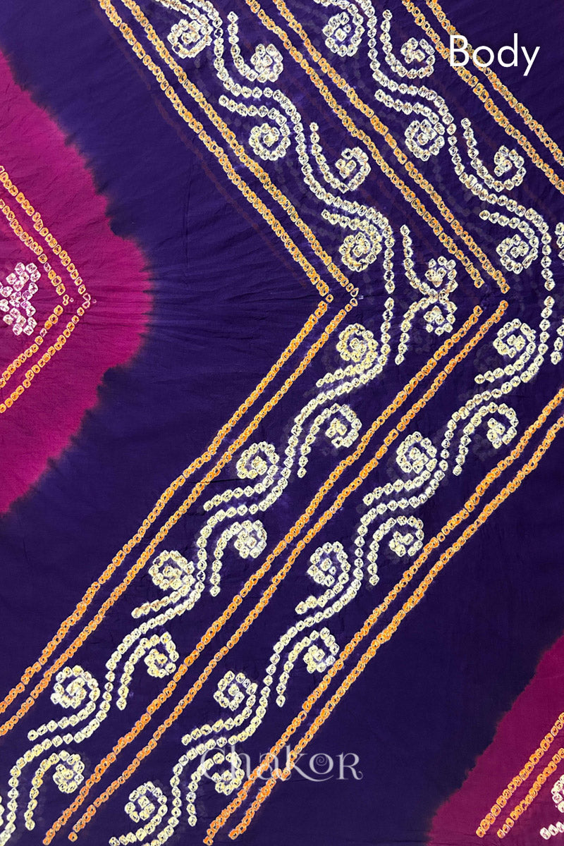 Body detail of Purple Magenta Bandhani Mul Cotton Saree featuring multicoloured bandhani patterns.