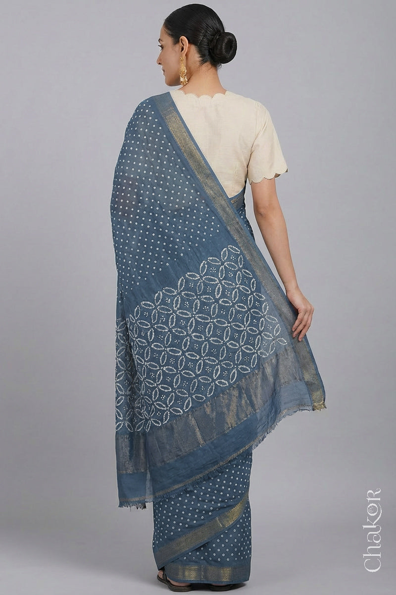 Woman wearing Gray Blue Bandhani Mangalagiri Handloom Cotton Saree, with handcrafted rai bandhej patterns using traditional tie-dye techniques.