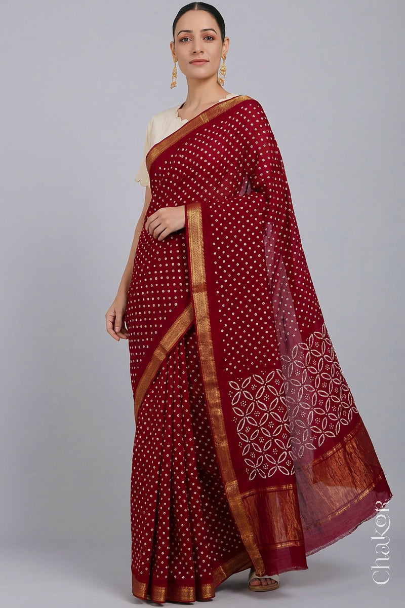 Woman wearing Bright Red Bandhani Mangalagiri Handloom Cotton Saree, with handcrafted rai bandhej patterns using traditional tie-dye techniques.