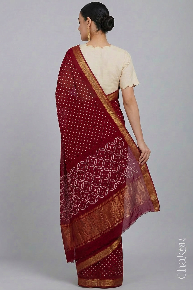 Woman wearing Bright Red Bandhani Mangalagiri Handloom Cotton Saree, with handcrafted rai bandhej patterns using traditional tie-dye techniques.