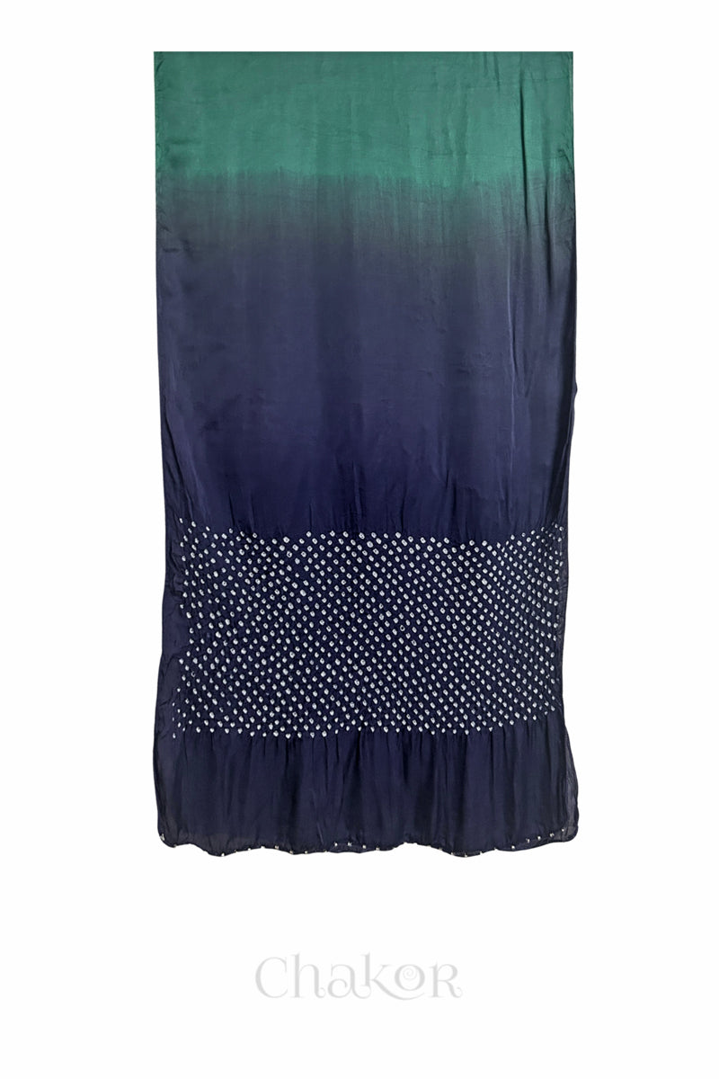 Full view of bandhani stole featuring ombre dyeing in teal & mauve and lustrous texture of modal fabric with 'Chakor' branding.
