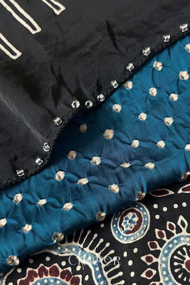 indigo blue Bandhani and black Ajrakh combination modal stole with glass bead edging detail on pallu end.
