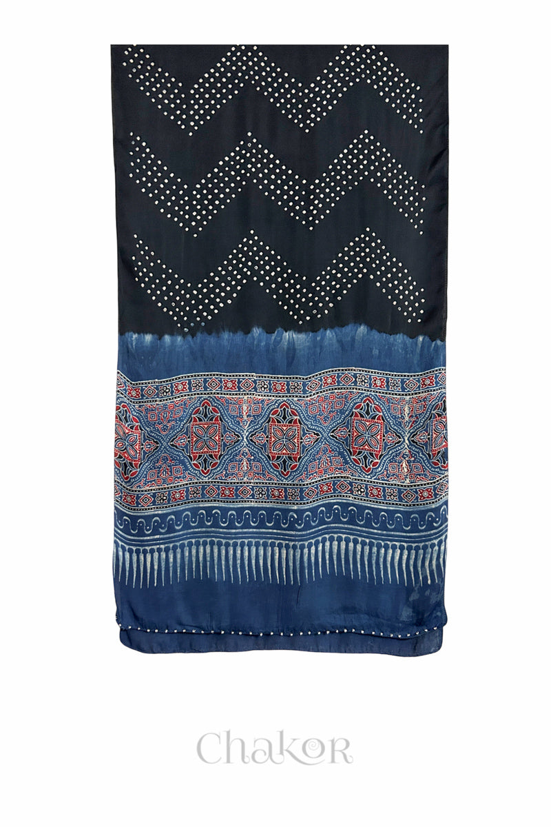 Black Bandhani modal stole with  Indigo Ajrakh pallu and traditional block print layout and glass bead edging.
