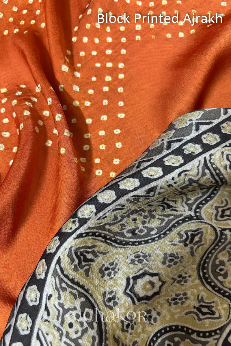 Close up of natural dye Taupe Beige Ajrakh print on handcrafted stole with intricate block printed motifs and delicate bandhani patterns.
