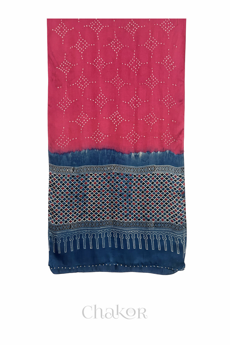 Strawberry Pink Bandhani modal stole with  Indigo Ajrakh pallu and traditional block print layout and glass bead edging.
