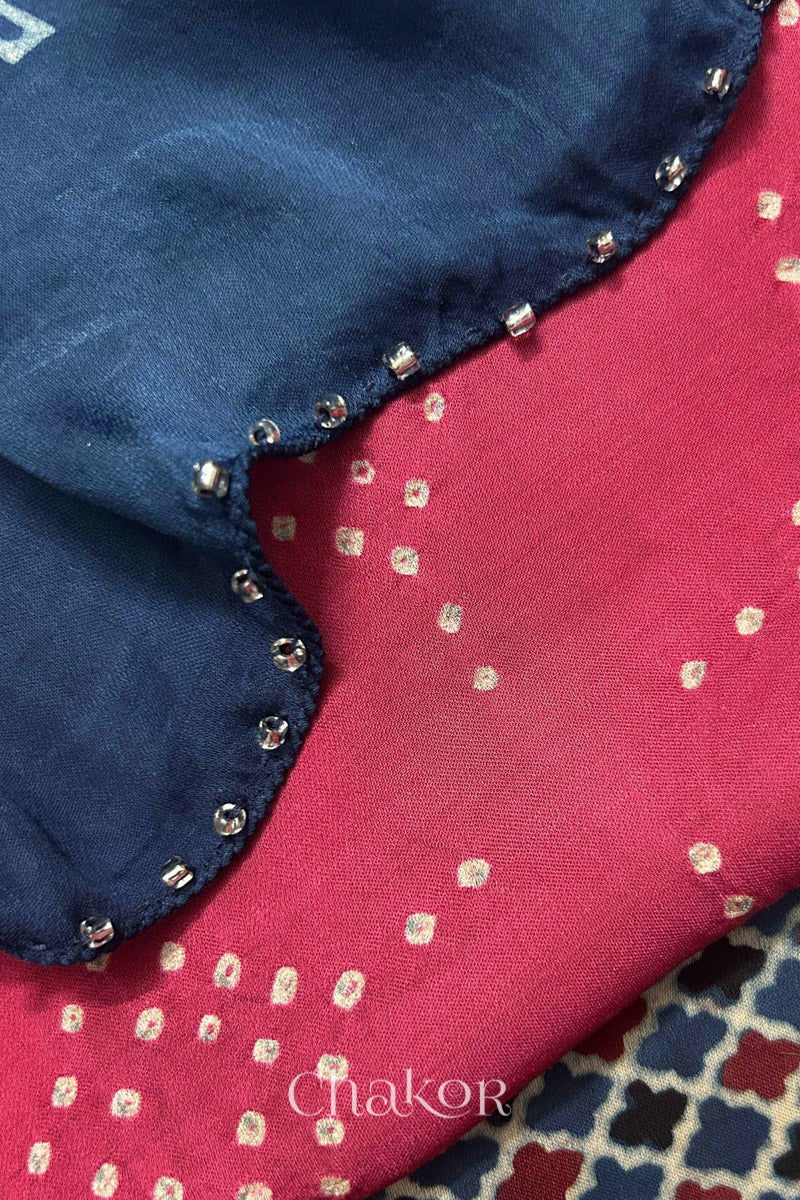  Strawberry Pink Bandhani and Indigo Ajrakh combination modal stole with glass bead edging detail on pallu end.
