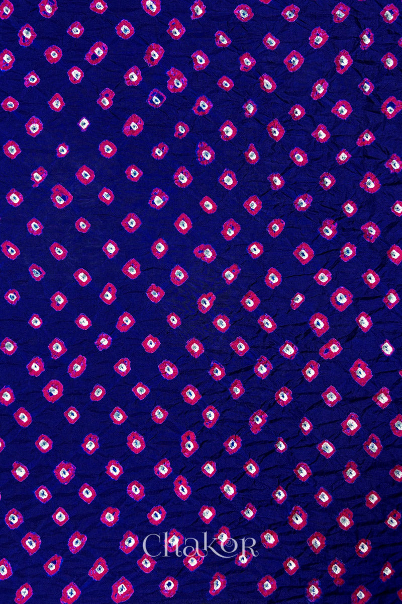 Navy Mulberry silk fabric showcasing dual colour Pink bandhani patterns and Chakor brand watermark.

