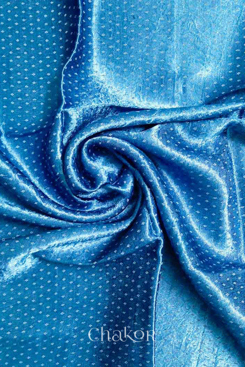 Close up of Handcrafted Blue grey Mashru Blouse Fabric with self woven design and silky texture.